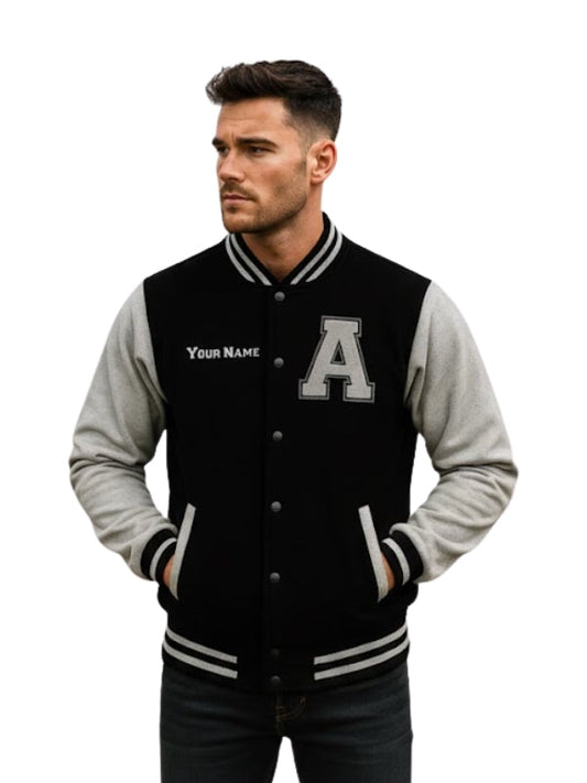Man wearing a black and gray varsity jacket with a letter 'A' on a white background
